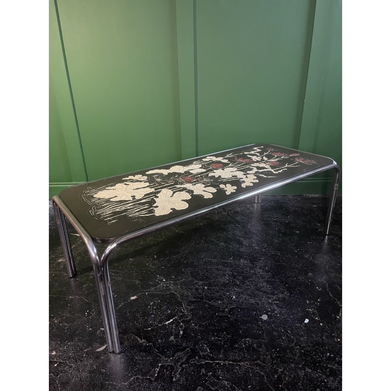 Tavolino vintage in tubolare cromato con piano in rilievo a motivi floreali, anni '70