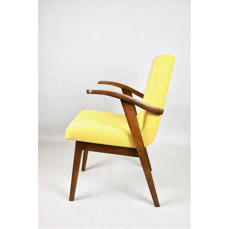 Vintage armchair in yellow fabric and lacquered wood by Mieczyslaw Puchala, 1970s