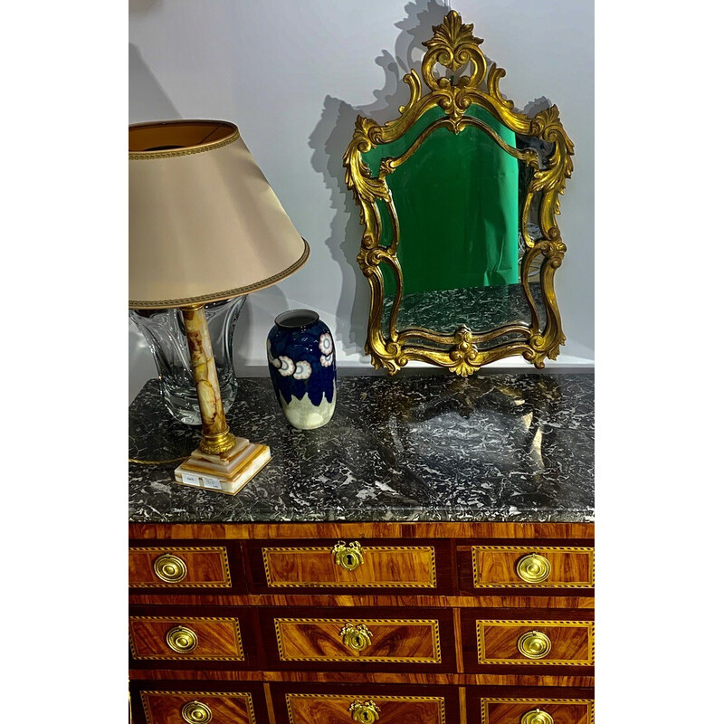 Miroir vintage en bois sculpté et doré