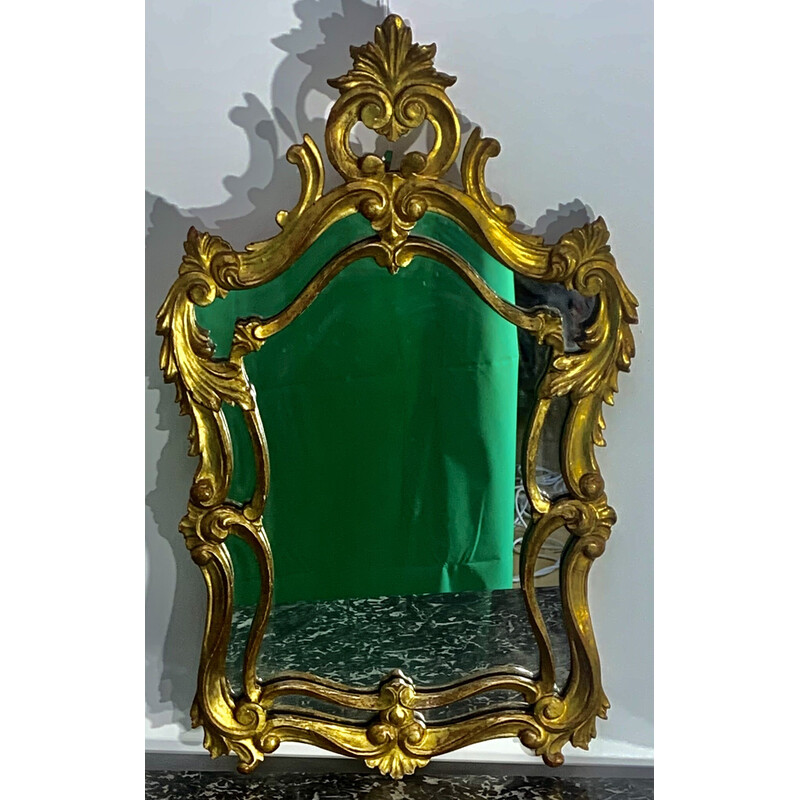Espejo vintage de madera tallada y dorada