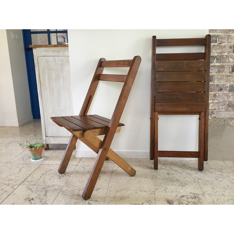 Pair of vintage folding chairs in solid wood