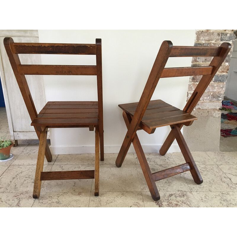 Pair of vintage folding chairs in solid wood