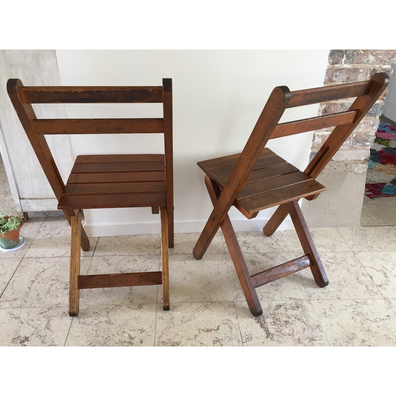 Pair of vintage folding chairs in solid wood