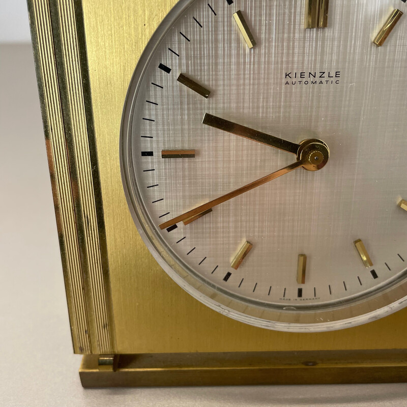 Vintage Hollywood Regency brass and glass table clock by Kienzle, Germany 1960s