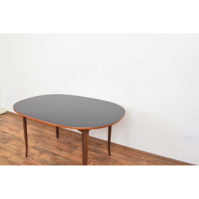 Mid-century teak table model "Ovalen" by Carlm Malmsten for Mobel Komponerad Av, Sweden 1950s