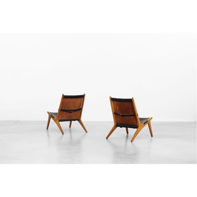 Pair of black lounge chairs by Uno and Osten Kristiansson for Vittsjomobel - 1950s