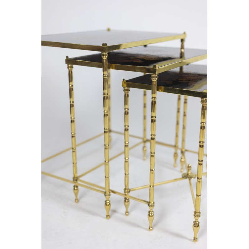 Vintage nesting tables in black lacquer and golden brass, France 1970s