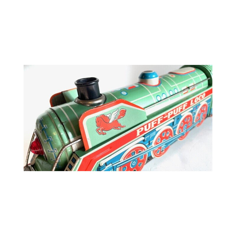 Vintage metal locomotive toy