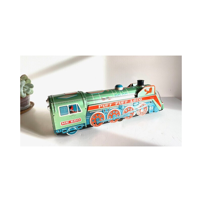 Vintage metal locomotive toy