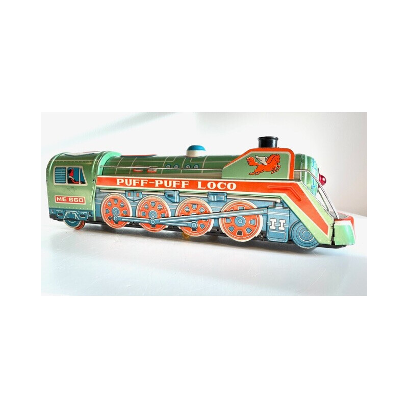 Vintage metal locomotive toy