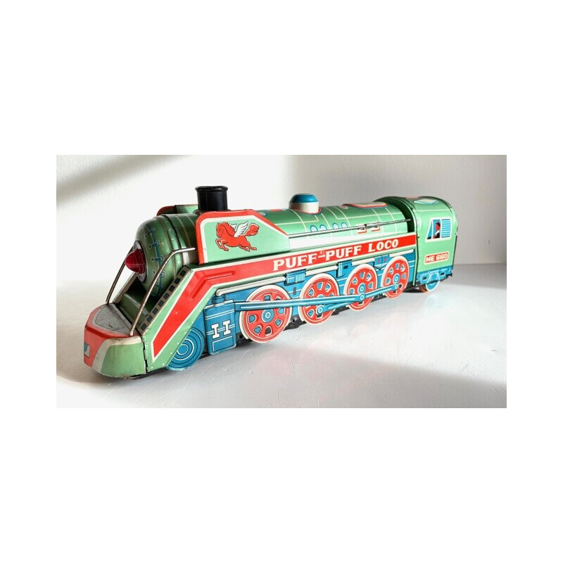 Vintage metal locomotive toy