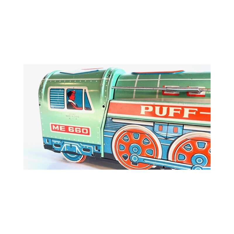 Vintage metal locomotive toy