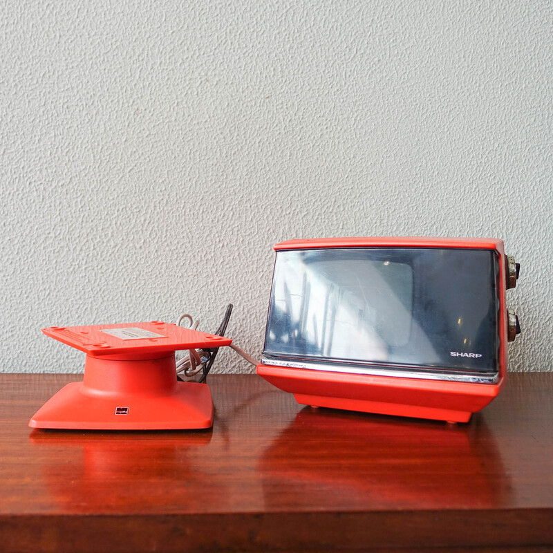 Vintage orange Sharp 5P 12G portable cube TV, 1970s