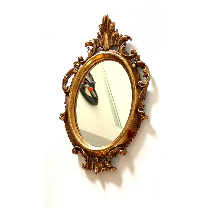 Vintage mirror in gilded wood