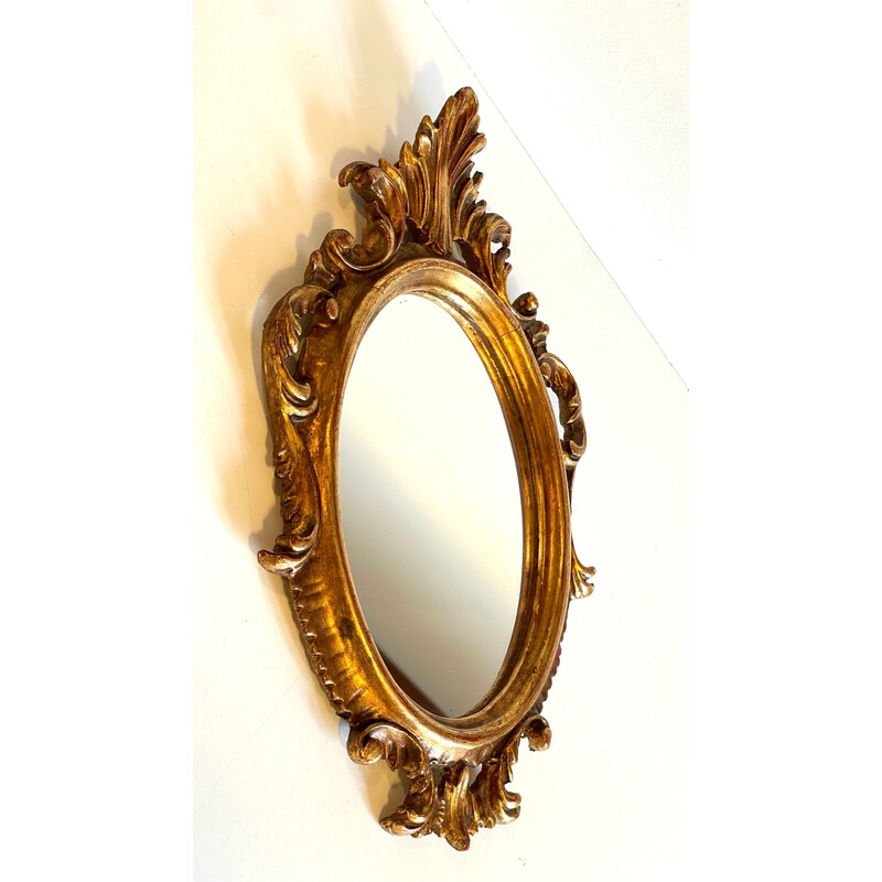 Vintage mirror in gilded wood