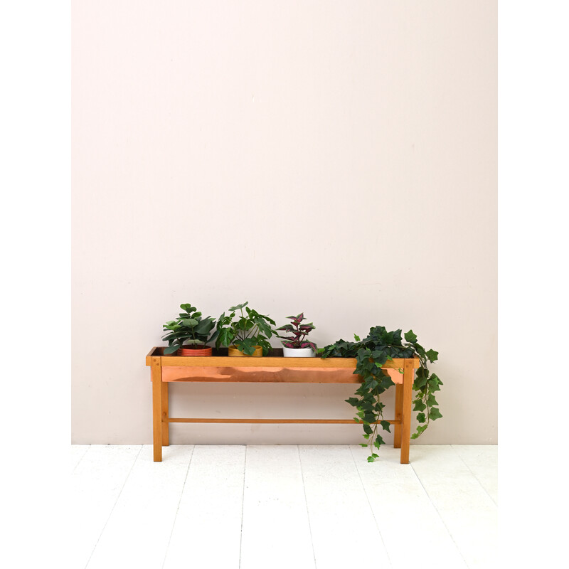 Vintage planter made of wood and copper