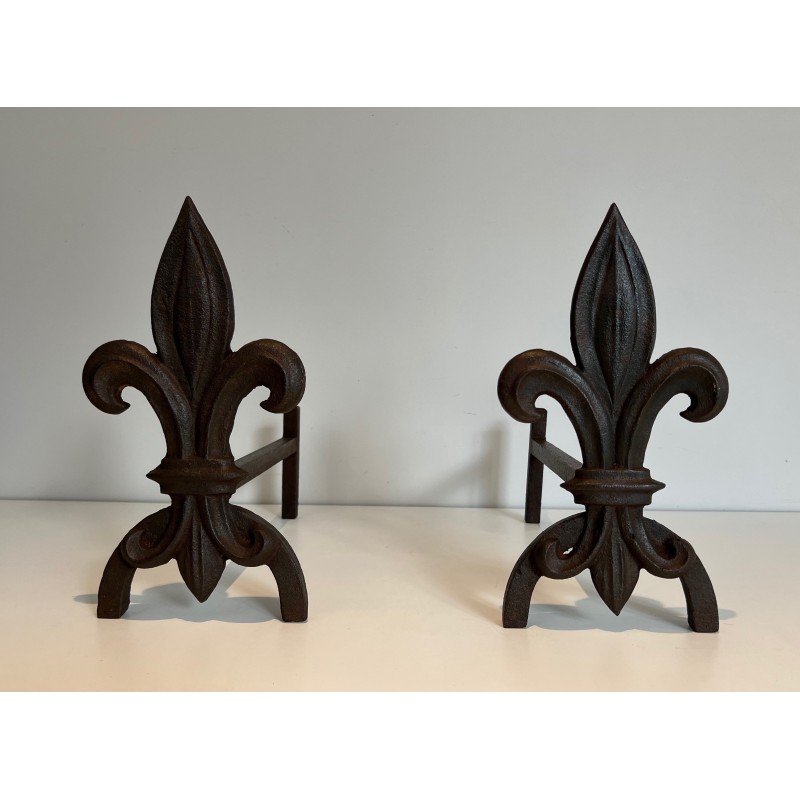 Pair of vintage andirons with fleur-de-lis in cast iron and wrought iron, 1970