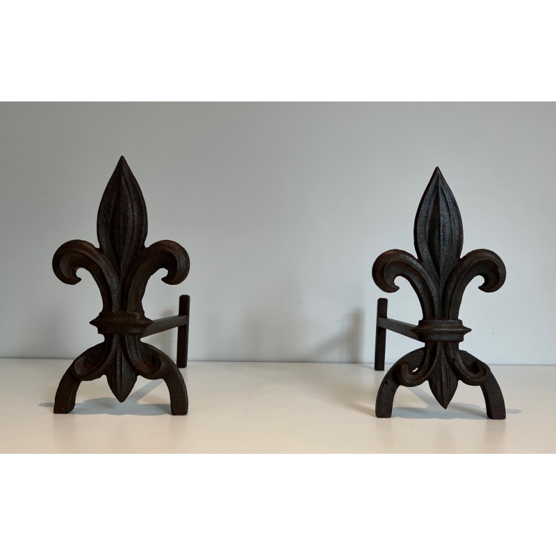Pair of vintage andirons with fleur-de-lis in cast iron and wrought iron, 1970