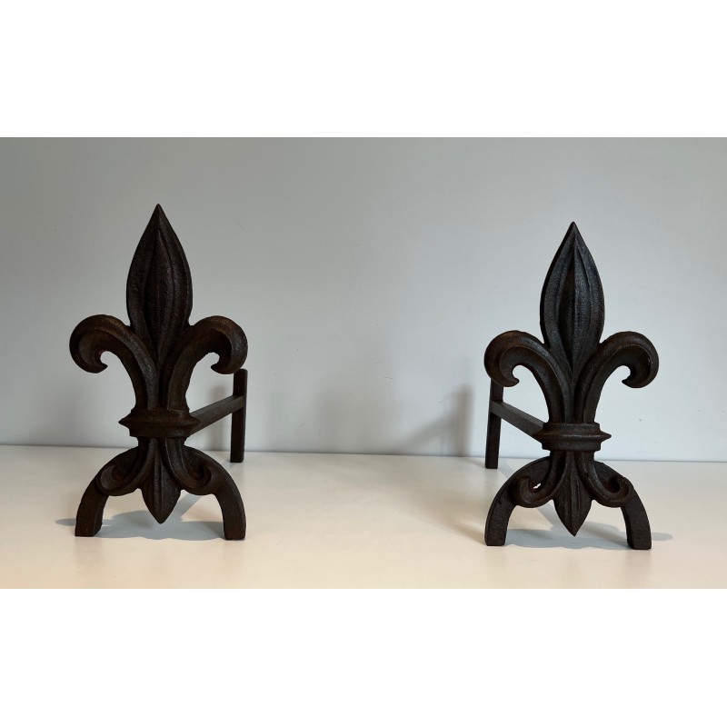 Pair of vintage andirons with fleur-de-lis in cast iron and wrought iron, 1970