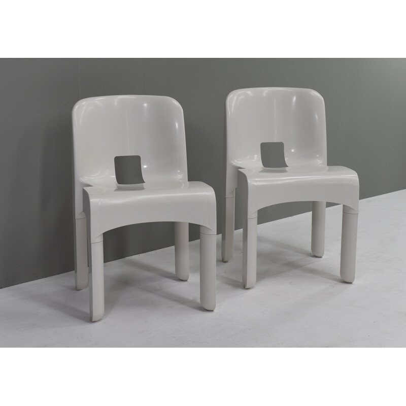 Set of 8 vintage chairs model 4867 in plastic and rubber by Joe Colombo for Kartell, Italy 1967s