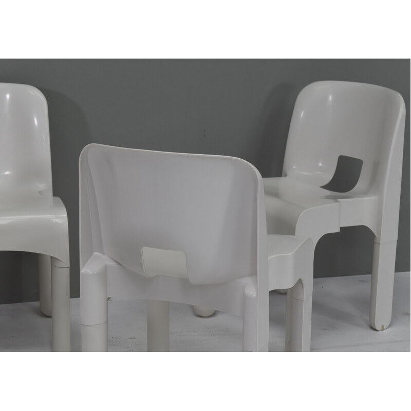 Set of 8 vintage chairs model 4867 in plastic and rubber by Joe Colombo for Kartell, Italy 1967s