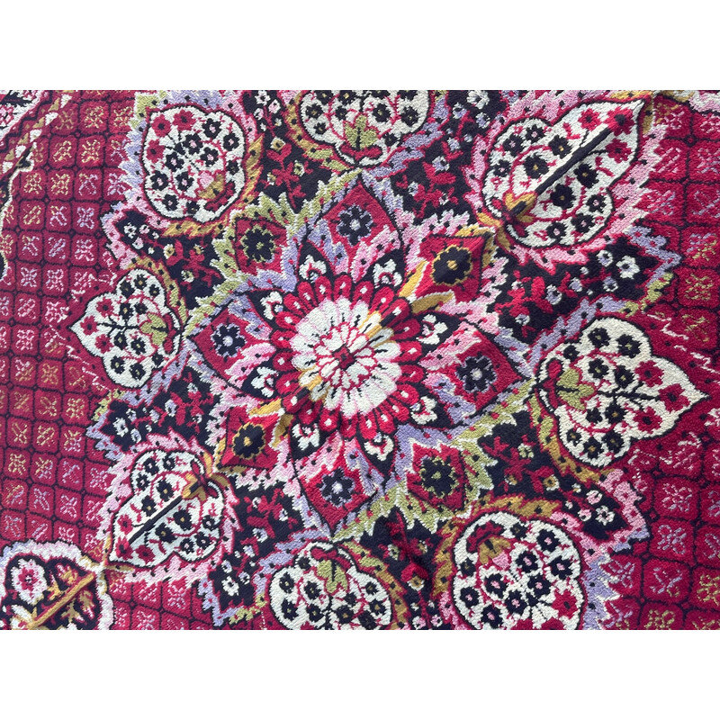 Vintage rug with floral design