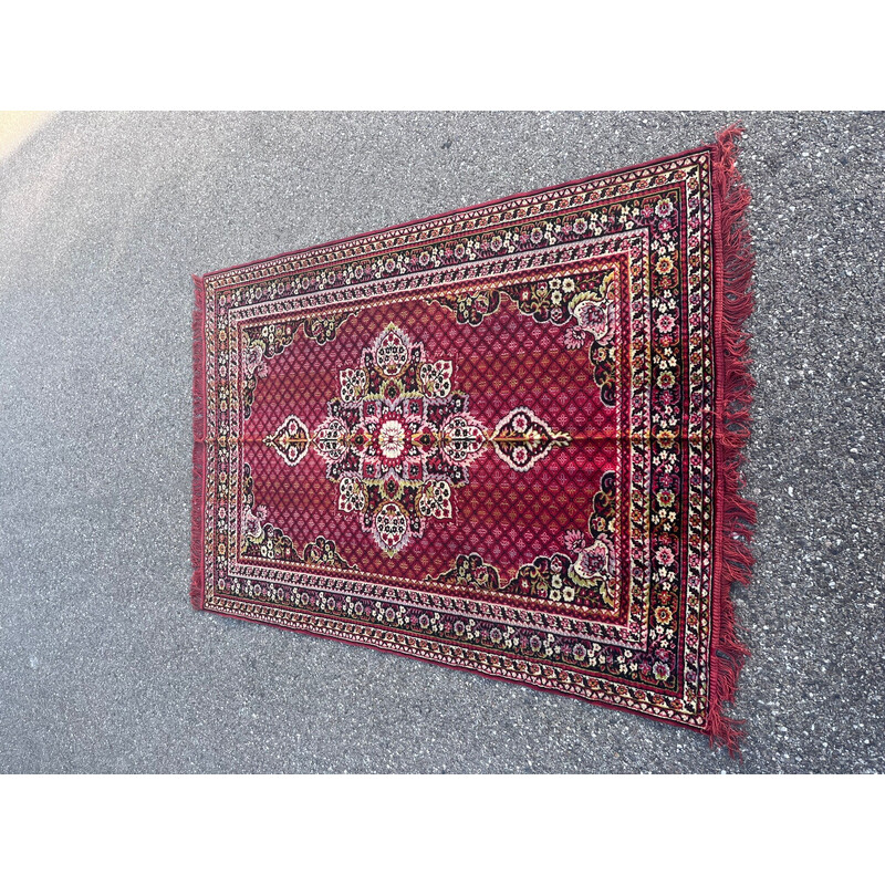 Vintage rug with floral design