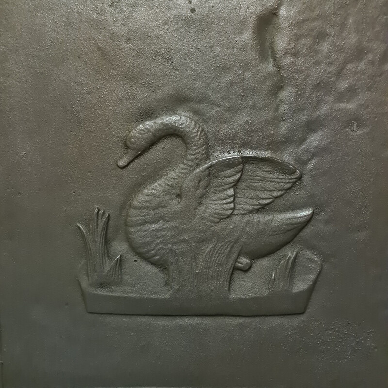 Vintage French cast iron fireback with a swan between the reeds
