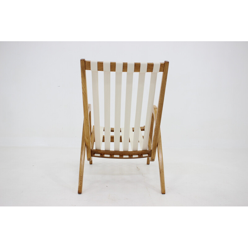 Vintage oakwood armchair by Jan Vaněk, Czechoslovakia 1970s