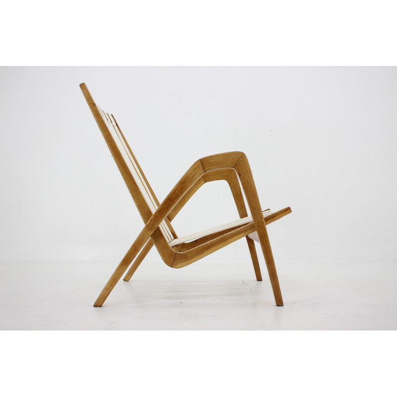 Vintage oakwood armchair by Jan Vaněk, Czechoslovakia 1970s