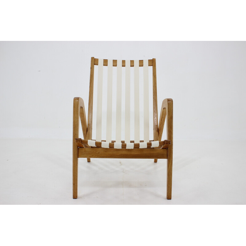 Vintage oakwood armchair by Jan Vaněk, Czechoslovakia 1970s