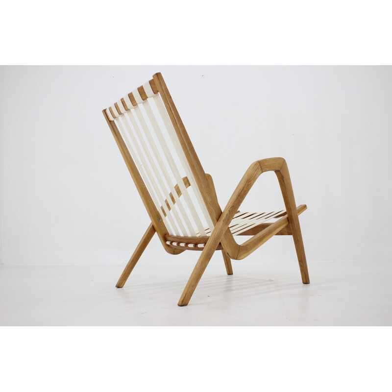 Vintage oakwood armchair by Jan Vaněk, Czechoslovakia 1970s