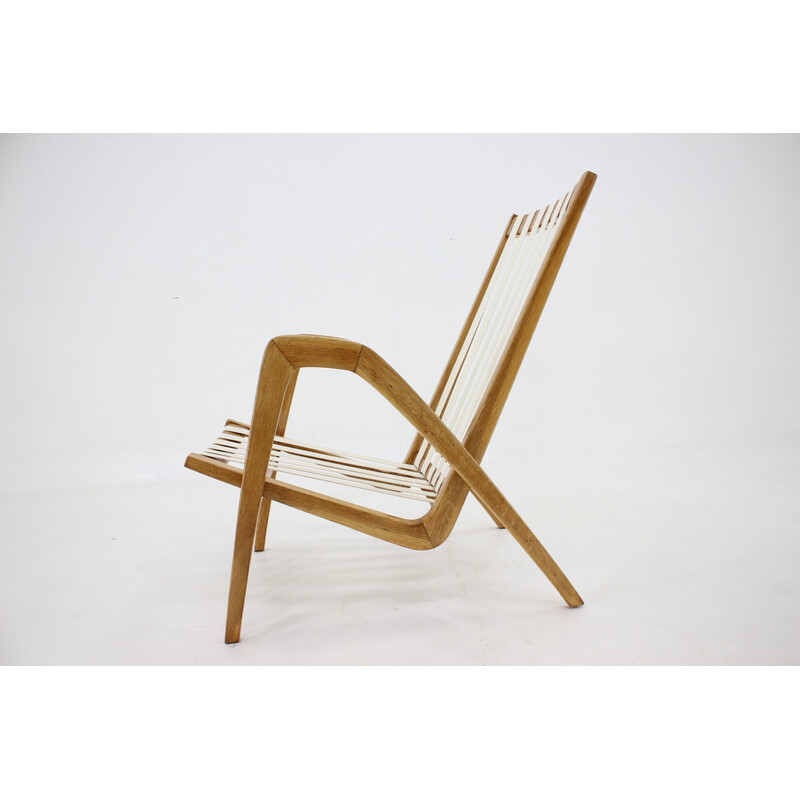 Vintage oakwood armchair by Jan Vaněk, Czechoslovakia 1970s