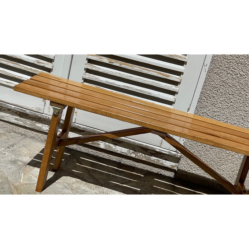 Vintage folding bench in varnished wood