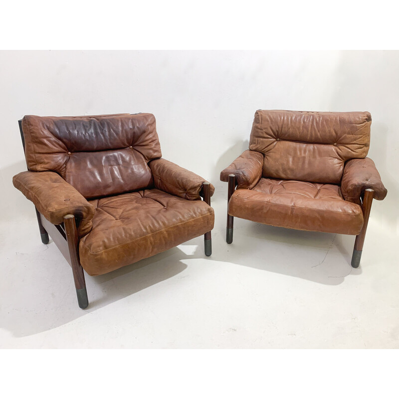 Pair of mid-century cognac leather armchairs by Carlo de Carli , Italy 1960s