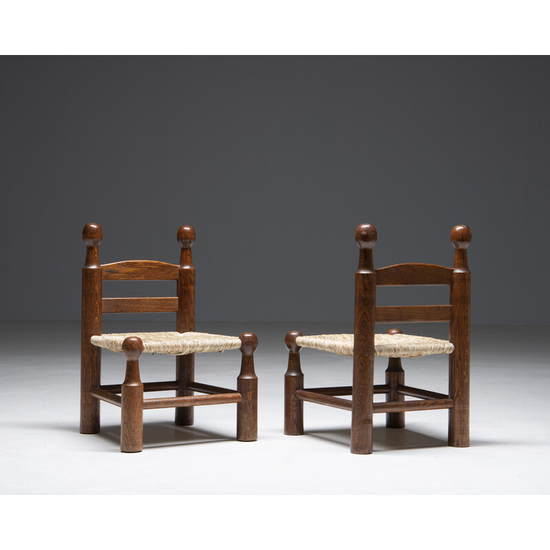 Pair of vintage oakwood and cane stools by Charles Dudouyt, France