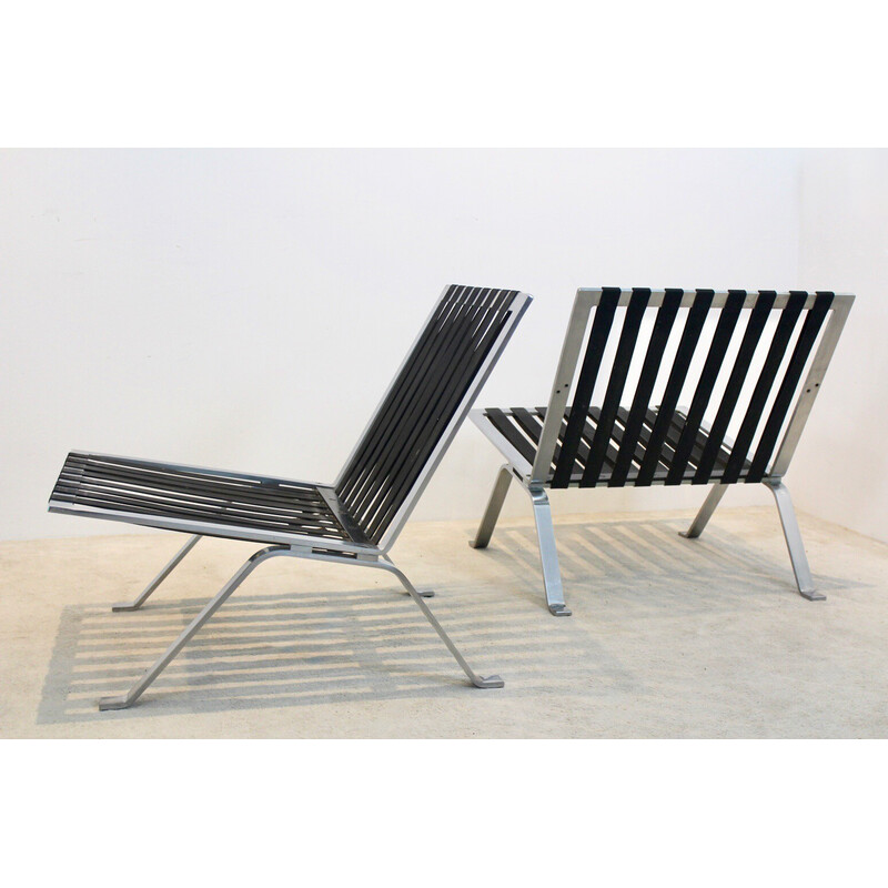 Par de cadeiras de couro vintage e de aço inoxidável por Hans Eichenberger para Girsberger, Suíça nos anos 60