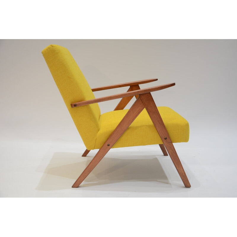 Yellow armchair with compass feet in teak - 1970s
