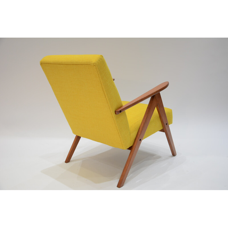 Yellow armchair with compass feet in teak - 1970s