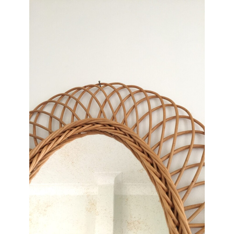 Vintage sun-shaped oval mirror in rattan - 1950s