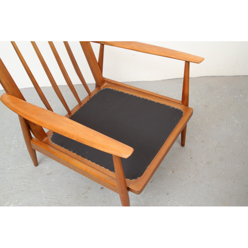 Vintage armchair in wood and red fabric, 1950