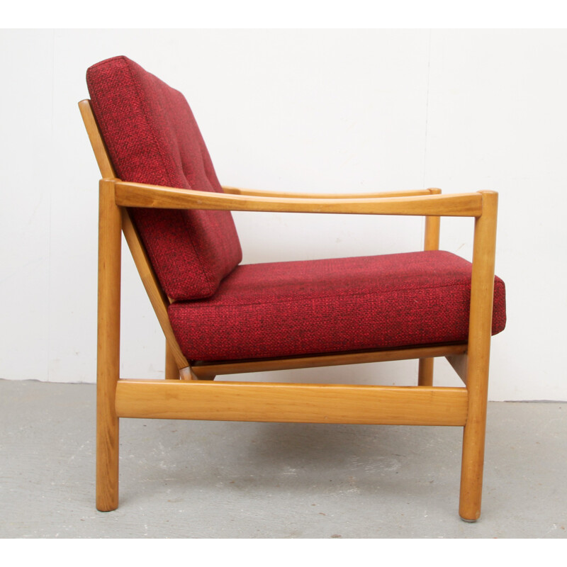 Fauteuil en bois massif et tissu rouge - 1950