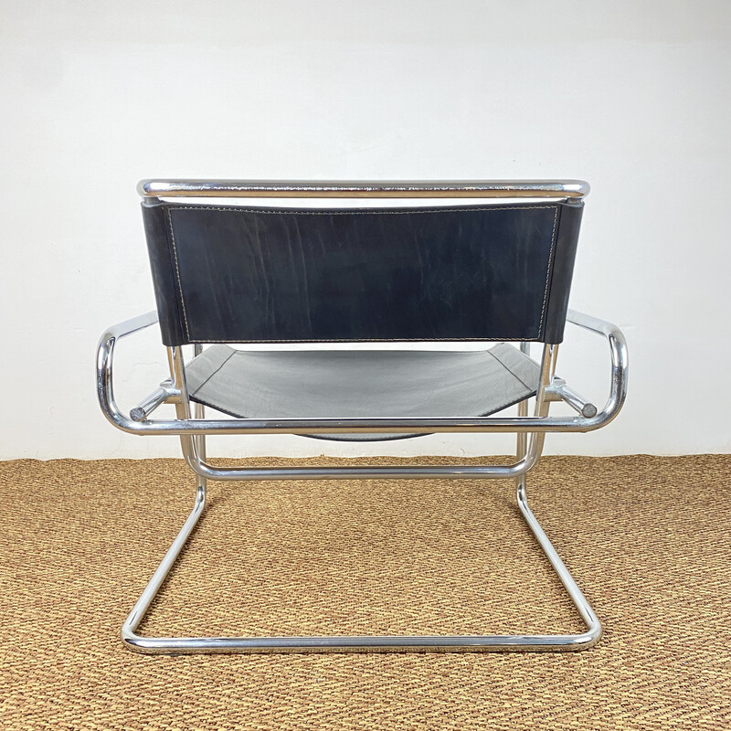 Vintage cantilever armchair in black leather and tubular steel by Luigi Saccardo for Arrmet