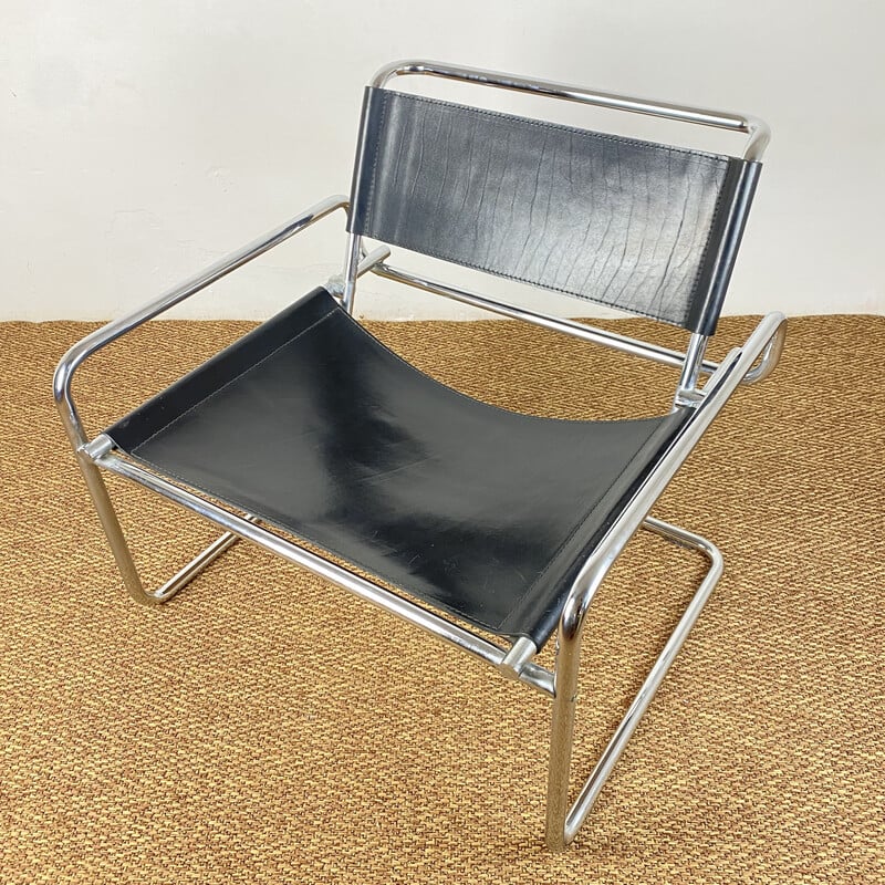 Vintage cantilever armchair in black leather and tubular steel by Luigi Saccardo for Arrmet