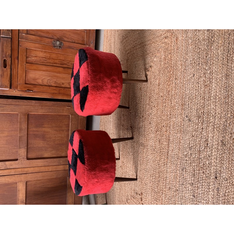 Pair of vintage wood and fabric poufs with red and black checkerboard pattern