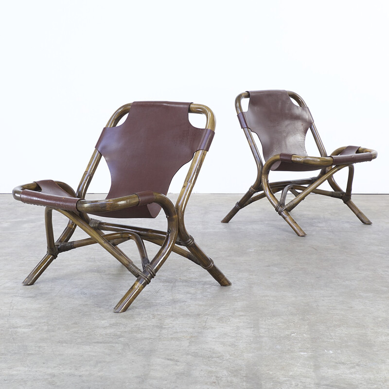 Pair of brown low chairs in leather and bamboo - 1980s