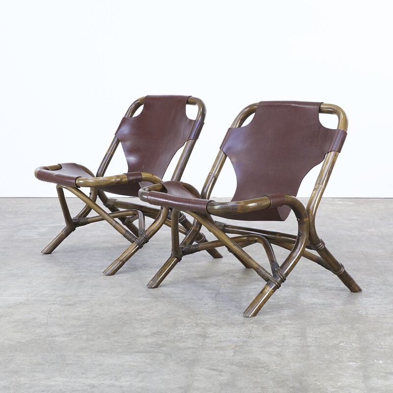 Pair of brown low chairs in leather and bamboo - 1980s