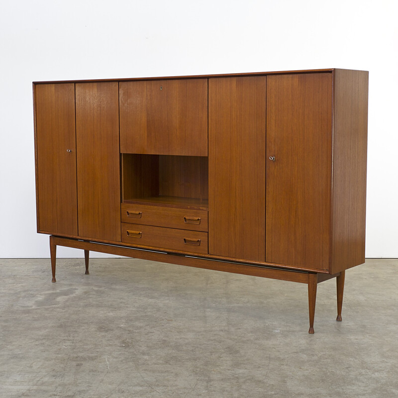 Teak cabinet with 4 doors, 2 drawers and 1 flapdoor produced by Vinde Mobelfabrik - 1960s