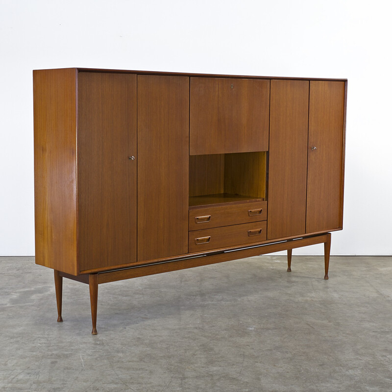 Teak cabinet with 4 doors, 2 drawers and 1 flapdoor produced by Vinde Mobelfabrik - 1960s