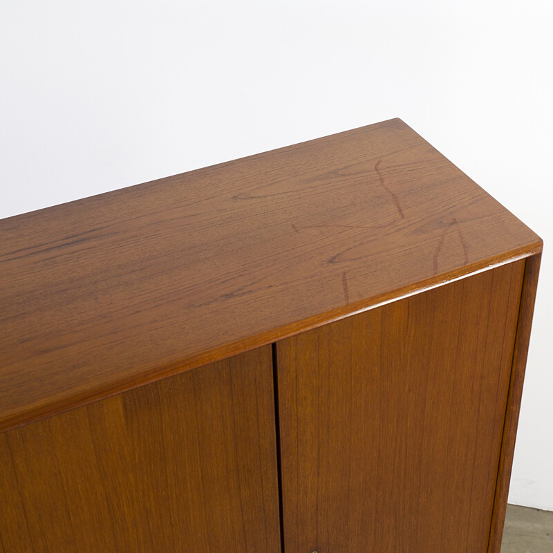 Teak cabinet with 4 doors, 2 drawers and 1 flapdoor produced by Vinde Mobelfabrik - 1960s